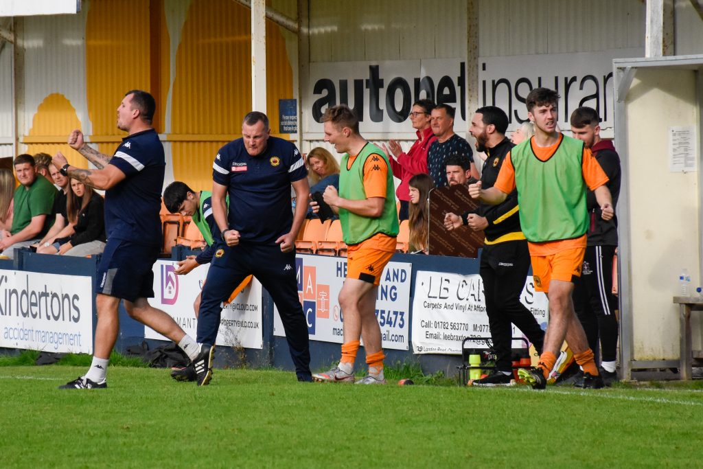 Prescot Cables and caretaker manager Lee Bignell celebrate during win over Kidsgrove