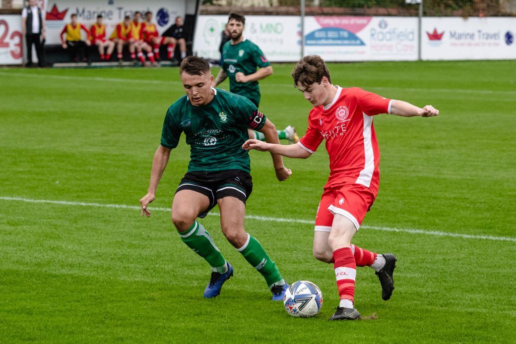 Burscough's Danny Brady in action against AFC Liverpool