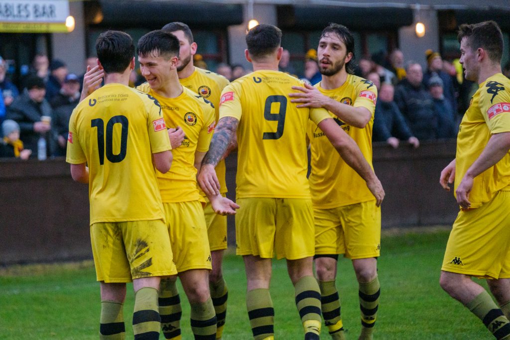 Prescot Cables celebrate during their win over Market Drayton