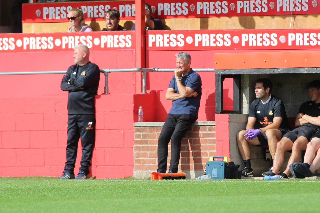 Southport manager Liam Watson watches on against Alfreton Town