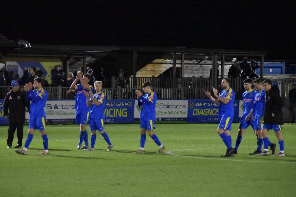 Bootle players celebrate beating Skelmersdale United