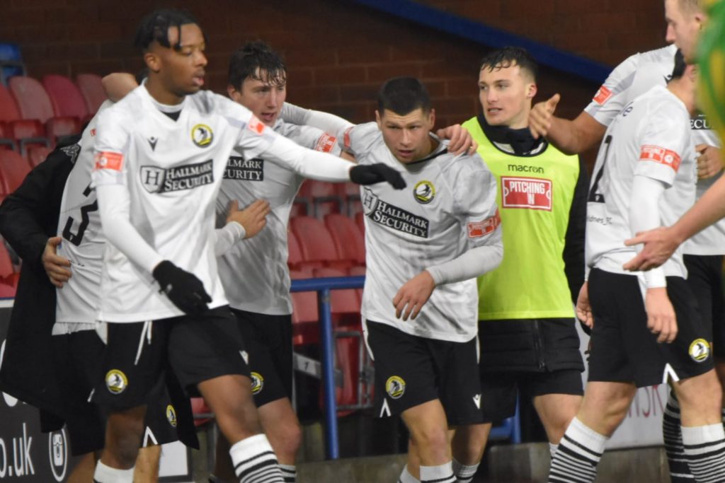 Widnes celebrate goal vs Runcorn Linnets